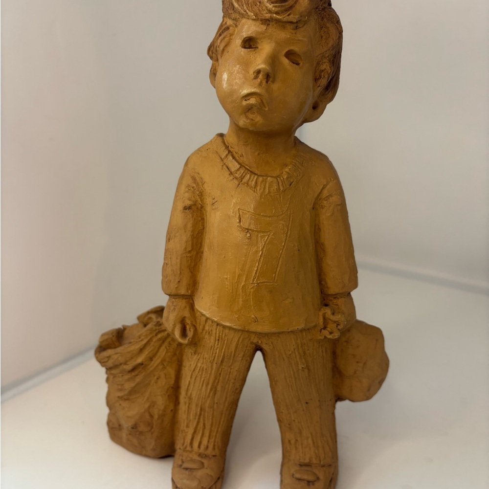 Vintage Lee Bortin Clay Boy carrying bag of toys Figurine